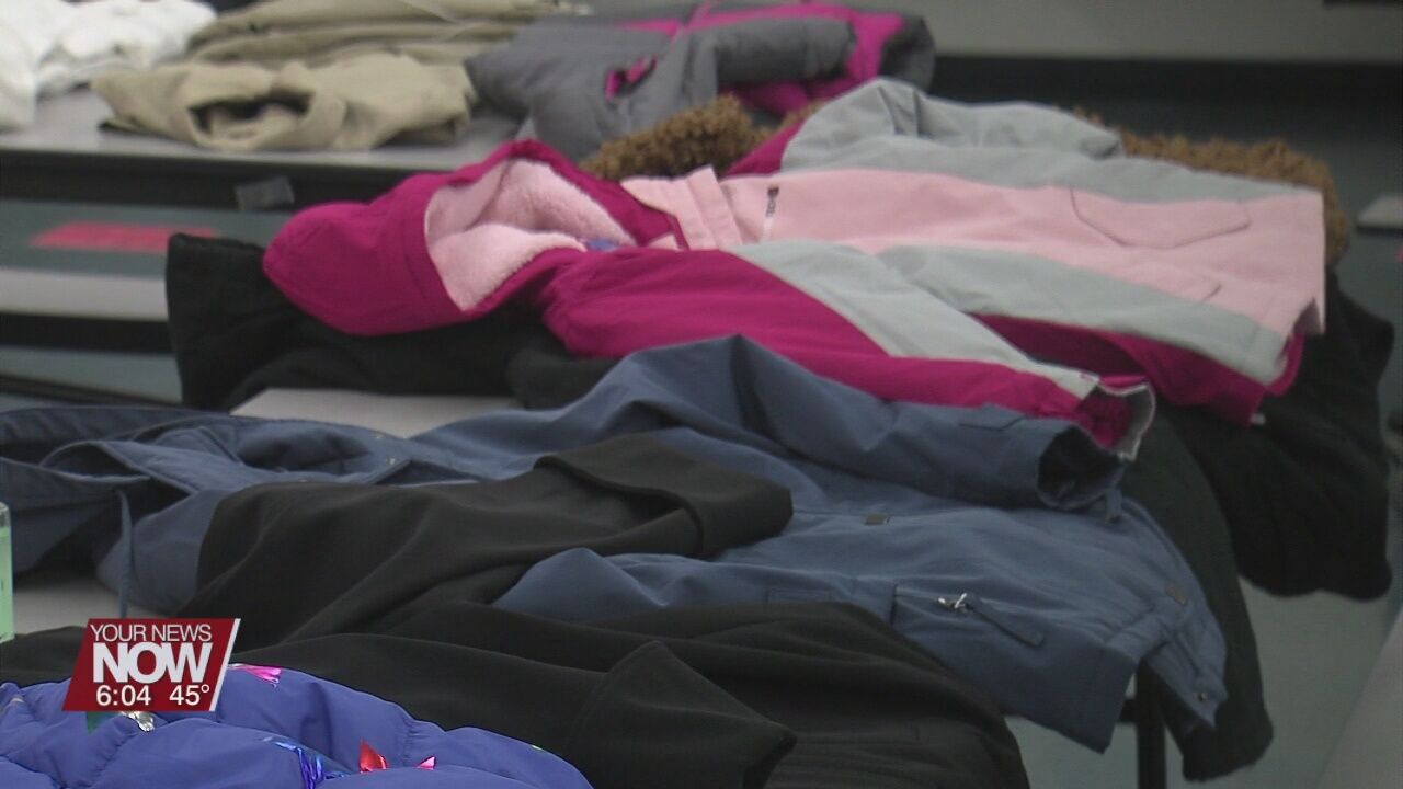 Students receive coats for school during Saturday event